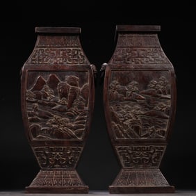 A pair of Qing agarwood carved landscape figure bottles