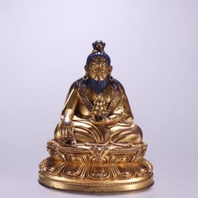 A Ming bronze gilt statue of Tang Dong Jiebu