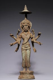 A standing statue of Javanese bronze Guanyin