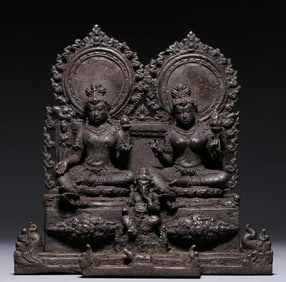 A bronze Parvati seated statue of Shiva