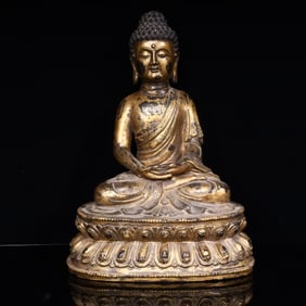 A piece of Qing Dynasty bronze clay gold Buddha statue