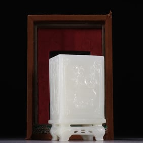 A piece of Qing Dynasty Hetian jade carved plum orchid bamboo chrysanthemum pen holder