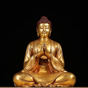 A piece of bronze gilt Buddha
