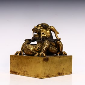 A Qing Dynasty bronze gold dragon twist seal