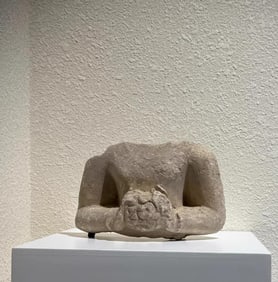 A white plaster bouquet of Bodhisattva statues