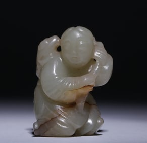 A piece of Ming and Qing Hetian jade seed material jujube red qin bangs play golden toad