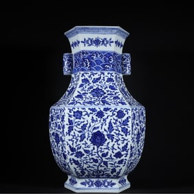 A pair of Qing Dynasty Qianlong blue and white entwined branches floral pattern hexagonal ear bottle