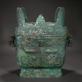 A bronze beast with a square face
