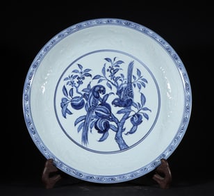 A Tibetan Ming Dynasty Xuande blue and white flower and bird plate