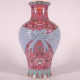 A piece of Qianlong in the Qing Dynasty pastel carmine ground entwined lotus furoshi bottle