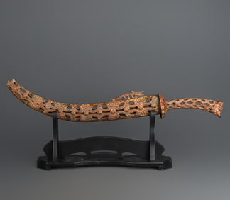 A Warring States bronze cut-out scimitar