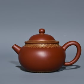 A piece of Qianlong gilt purple clay pot of the Qing Dynasty