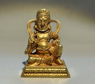 A pure gold statue of the god of wealth