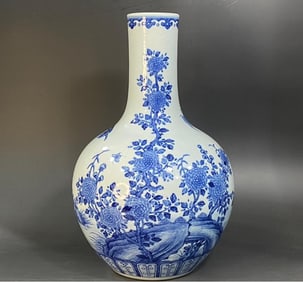 A late Qing blue flower bird celestial globe vase