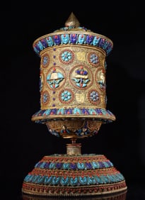 A piece of Tibetan silver filigree inlaid with precious stones eight treasure prayer wheel