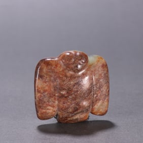 A piece of Red Mountain Culture River Mill Jade Owl
