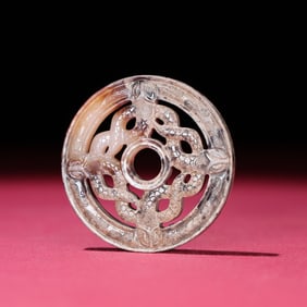 A piece of Hetian white jade full of snake patterns