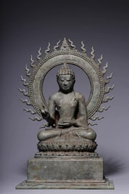 A bronze seated statue of Shakyamuni in Java, Southeast Asia