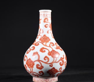 A piece of Daming Xuande year sweet white glazed vanadium red Ruyi Ganoderma lucidum pattern hanging