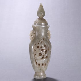 A piece of Liaojin Hetian jade carved all the way to the bottle