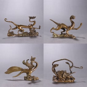 A set of late Qing Dynasty bronze tire four sacred beast ornaments
