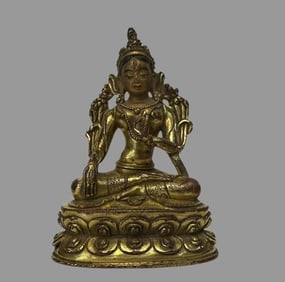 One piece of copper-gilt white Tara