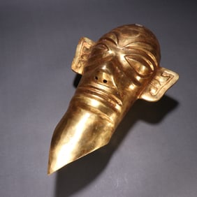 A piece of bronze gilt Sanxingdui cultural mask man