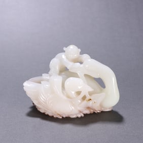 A Qing Hetian jade boy playing goose ornament