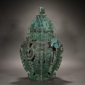 A bronze beast with a square face