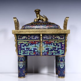 A Qing Dynasty cloisonne lion button four-legged incense burner