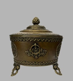 A piece of copper round tsampa box