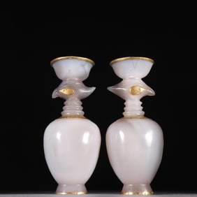 A pair of agate wrapped golden phoenix head pots