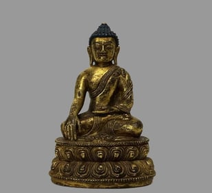 A piece of bronze gilt Shakyamuni