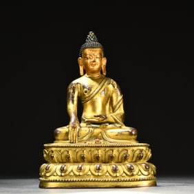 A Ming and Qing Dynasty bronze gilt Buddha statue