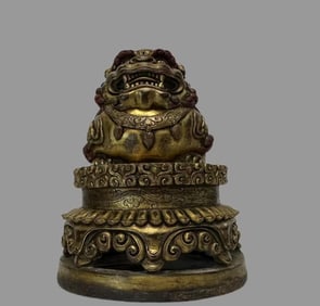 A bronze gilt lion seal
