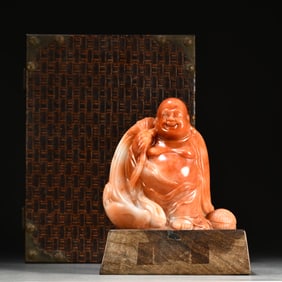 A hibiscus stone carved cloth bag monk ornament
