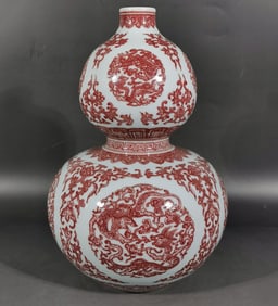 A piece of Qing Qianlong glaze red group dragon gourd bottle