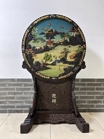 A piece of rosewood inlaid with a treasure figure mirror