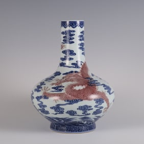 A piece of Qing Qianlong year blue and white glaze red cloud dragon pattern mustard bottle