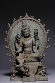 A Javanese century bronze seated statue of Tara