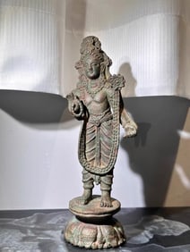 A bronze 2nd-3rd century lotus hand Guanyin standing statue