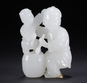 A piece of Hetian jade drumming boy