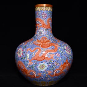 A piece of Qing Qianlong blue ground rolling pastel alum red nine dragon pattern large celestial