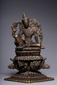 A Qing Dynasty alloy copper inlaid with silver statue of Guanyin