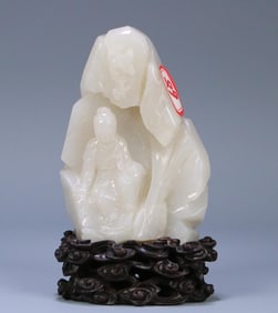A Qing Dynasty Hetian jade Guanyin Shanzi ornament