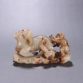 A Ming Hetian jade unicorn gift ornament