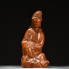 A Qing Dynasty boxwood Guanyin ornament
