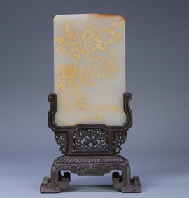 A piece of Qing Dynasty Hetian jade seed material filled with gold-filled characters landscape