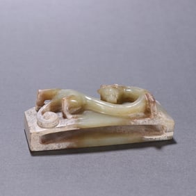 A sword ornament with a dragon pattern of ancient jade