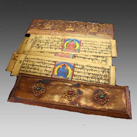 A gilt bronze scripture